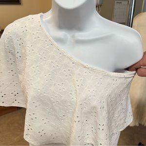 Ladies white eyelid shirt half on half off the shoulder